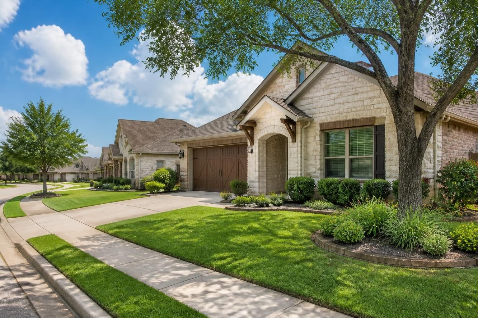 Residential district with tidy homes and green lawns.